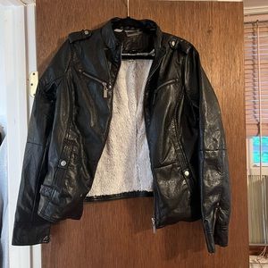 Leather jacket with furry inside